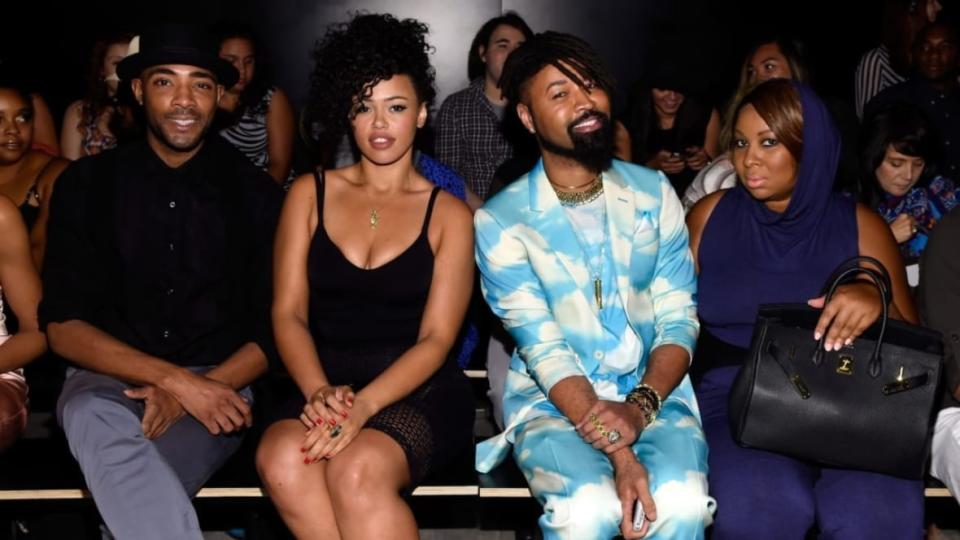 Seated together at 2014’s Fashion Week in New York City are (from left) guest Andre, singer Elle Varner, stylist Ty Hunter and blogger Claire Sulmers in 2014, New York City. (Photo: Larry Busacca/Getty Images for Mercedes-Benz Fashion Week)