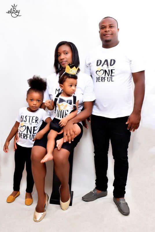 Rosemond Clermont, who had his construction business destroyed in an earthquake in Les Cayes, poses with his family