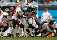 Steve Smith #89 of the Carolina Panthers is tackled by Ronde Barber #20 of the Tampa Bay Buccaneers during their game at Bank of America Stadium on December 24, 2011 in Charlotte, North Carolina. (Photo by Streeter Lecka/Getty Images)