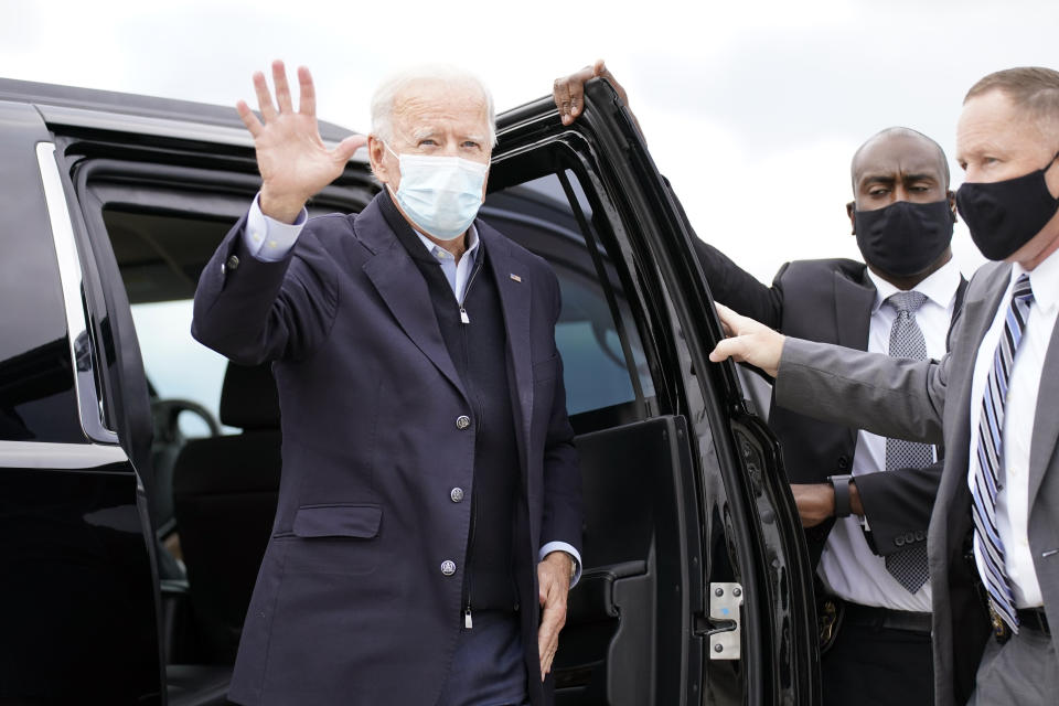 Democratic presidential candidate former Vice President Joe Biden boards his campaign plane at Gerald R. Ford International Airport in Grand Rapids, Mich., Friday, Oct. 2, 2020, to travel to New Castle Airport in New Castle, Del. after speaking at United Food & Commercial Workers Union Local 951. (AP Photo/Andrew Harnik)