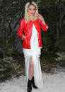 Chanel SS13: Rita Ora broke the trend for all-black in her red jacket and white gown ©Rex