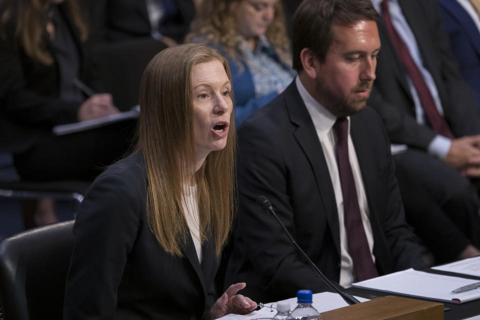 Monika Bickert, head of global policy management at Facebook, joined at right by Nick Pickles, public policy director for Twitter, testifies before the Senate Commerce, Science and Transportation Committee during a hearing on how internet and social media companies are prepared to thwart terrorism and extremism, Wednesday, Sept. 18, 2019, on Capitol Hill in Washington. (AP Photo/J. Scott Applewhite)