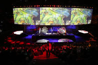 A general view during the final of League of Legends tournament between Team G2 Esports and Team FunPlus Phoenix, in Paris, Sunday, Nov. 10, 2019. The biggest e-sports event of the year saw a Chinese team, FunPlus Phoenix, crowned as world champions of the video game League of Legends. Thousands of fans packed a Paris arena for the event, which marked another step forward for the growing esports business. (AP Photo/Thibault Camus)