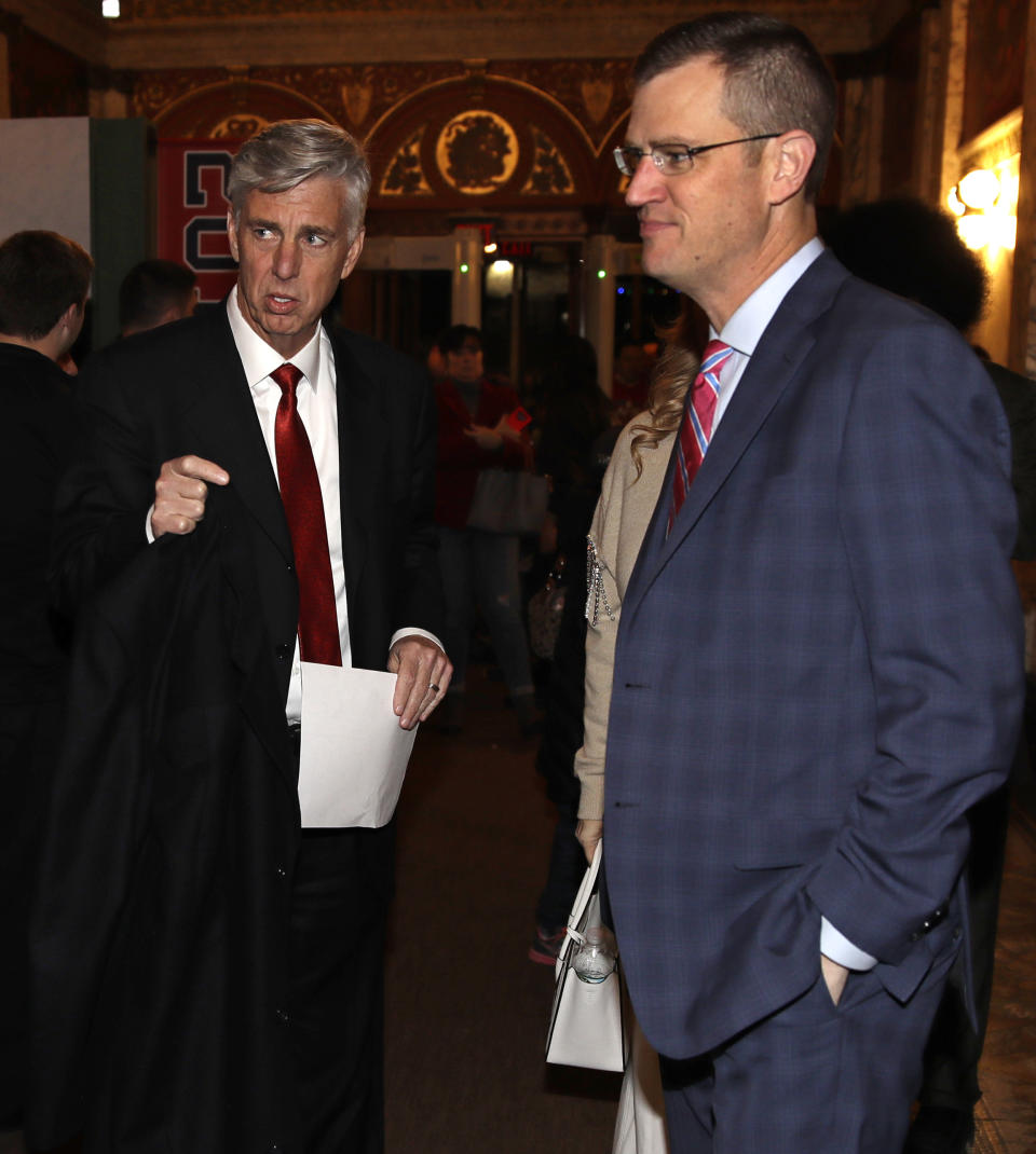 Boston Red Sox CEO Sam Kennedy, right, and Dave Dombrowski, left, the team's president of baseball operations, arrive for the premiere of "The 2018 World Series: Damage Done," documentary production that captures video moments of the Red Sox's march towards the 2018 World Series Championship, Monday, Dec. 3, 2018. (AP Photo/Charles Krupa)