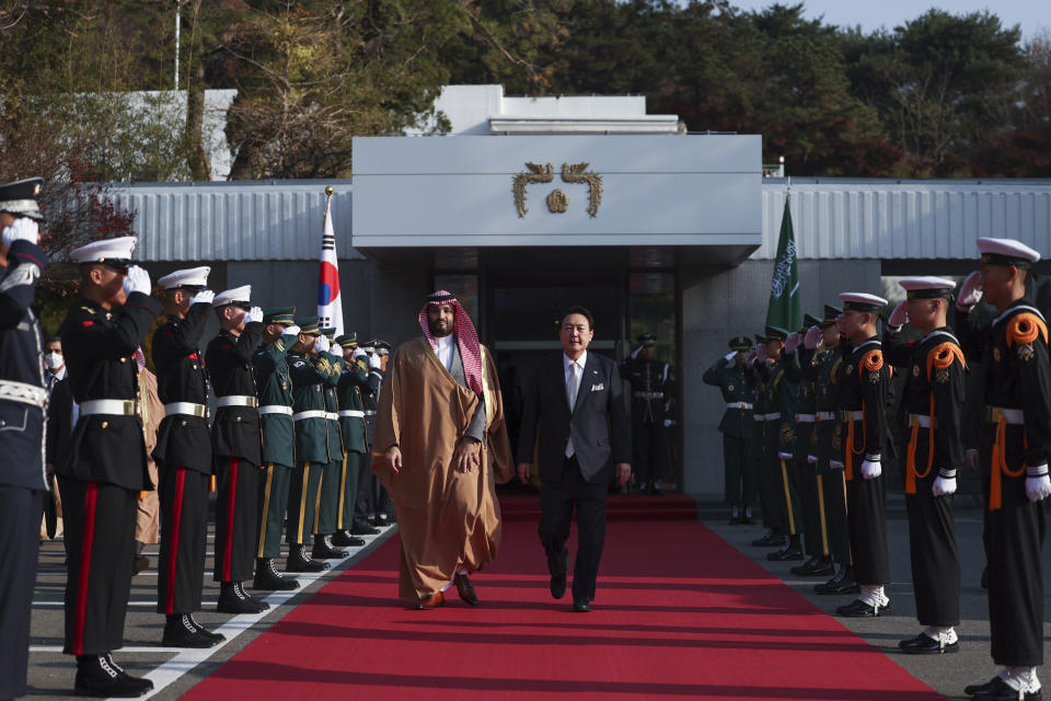 Saudi Arabian Crown Prince Mohammed bin Salman, center left, leaves after meeting with South Korean President Yoon Suk Yeol at the presidential residence in Seoul, South Korea, Thursday, Nov. 17, 2022. (South Korean Presidential Office/Yonhap via AP)