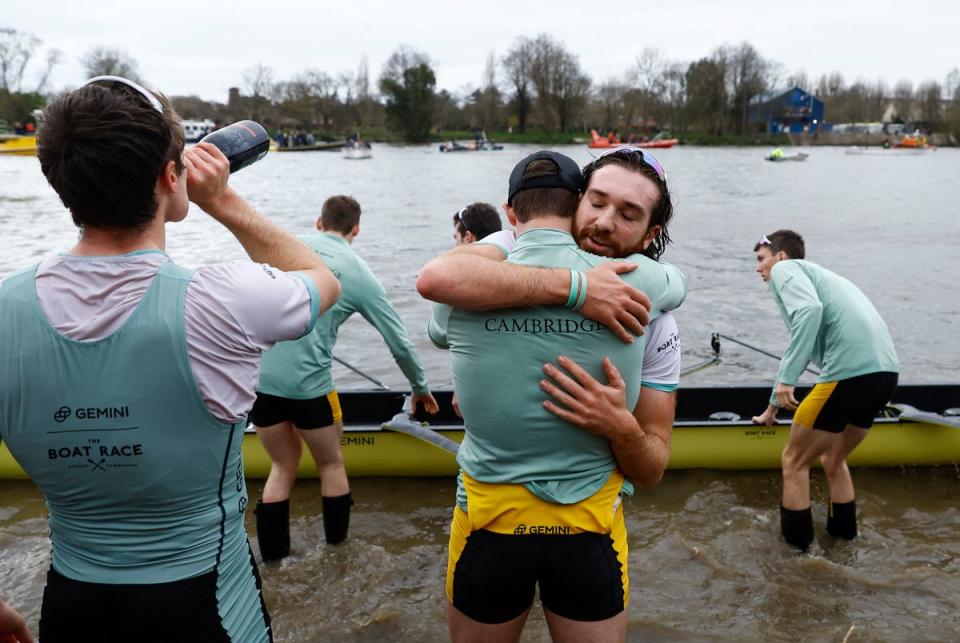 University Boat Race - Oxford v Cambridge: Cambridge rower Seb Benzecry celebrates with a teammate after winning the men’s race (Action Images via Reuters)