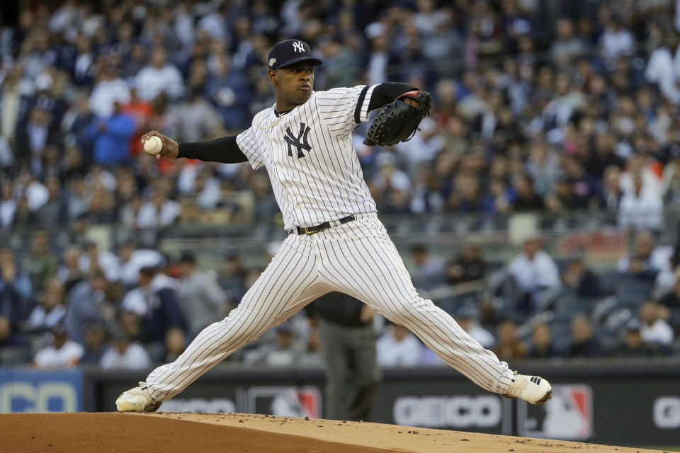 FILE - In this Oct. 15, 2019, file photoNew York Yankees starting pitcher Luis Severino delivers against the Houston Astros during the first inning of Game 3 of baseball's American League Championship Series in New York. Severino was activated by the New York Yankees before Monday's series opener against the Texas Rangers and is in position to make his first major league appearance in nearly two years. Yankees manager Aaron Boone says he plans to use Severino out of the bullpen. (AP Photo/Frank Franklin II, File)