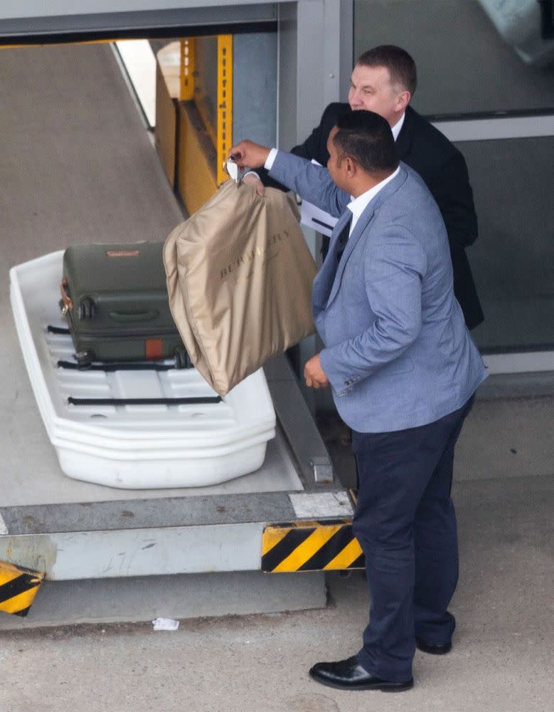 A royal driver was seen collecting Doria bags and her Burberry garment bag at Heathrow Airport.
