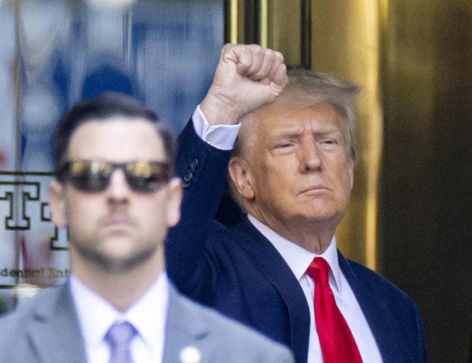 Former President Trump leaves Trump Tower for Manhattan Criminal Court in New York on Tuesday, April 4, 2023. Trump will be booked and arraigned on charges arising from hush money payments during his 2016 campaign. (AP Photo/Corey Sipkin)