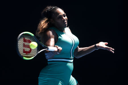 Tennis - Australian Open - Quarter-final - Melbourne Park, Melbourne, Australia, January 23, 2019. Serena Williams of the U.S. in action with Czech Republic's Karolina Pliskova. REUTERS/Edgar Su