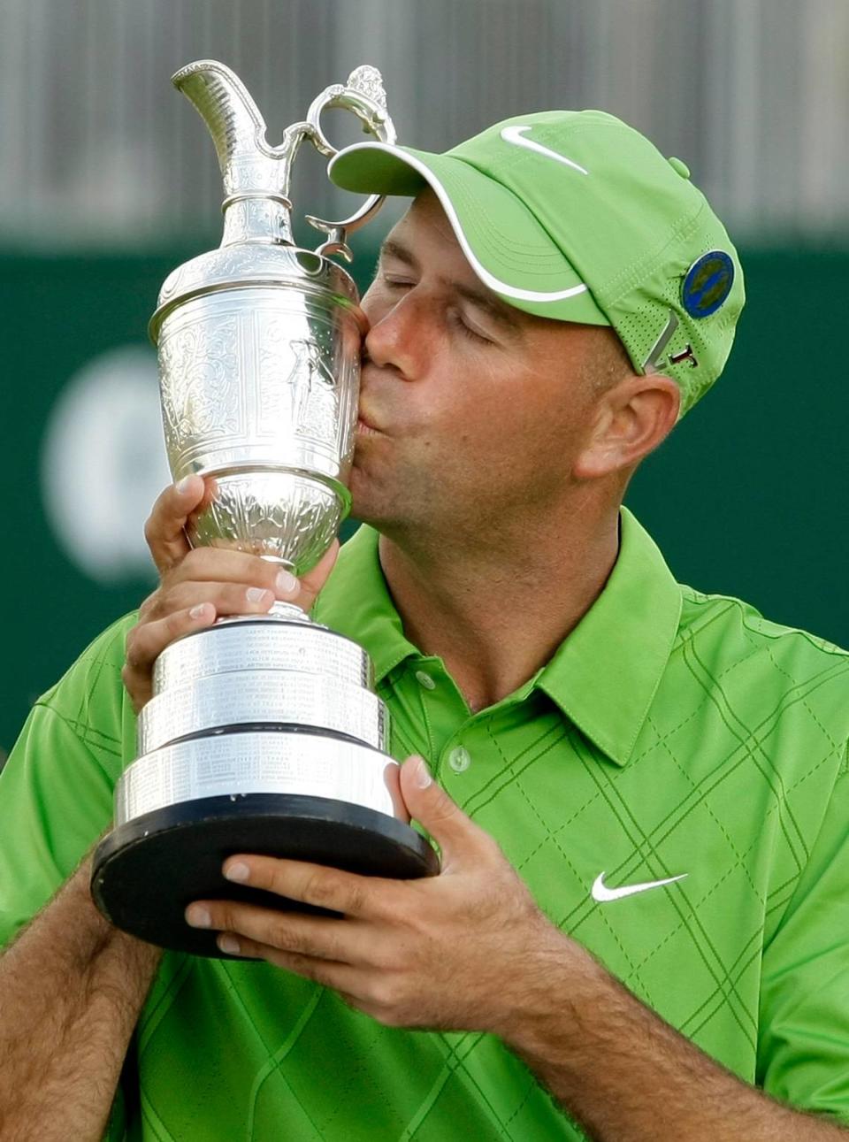 Stewart Cink of the US kisses the trophy after winning a playoff following the final round of the British Open Golf championship, at the Turnberry golf course, Scotland, Sunday, July 19, 2009. (AP Photo/Matt Dunham)