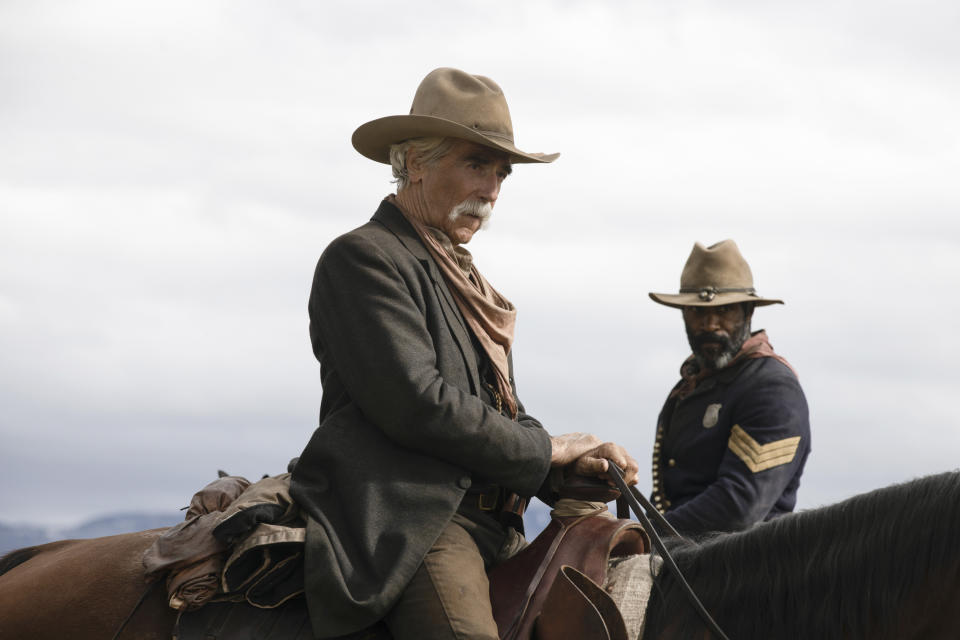 This image released by Paramount+ shows Sam Elliott, center, and LaMonica Garrett in a scene from "1883." (Emerson Miller/Paramount+ via AP)