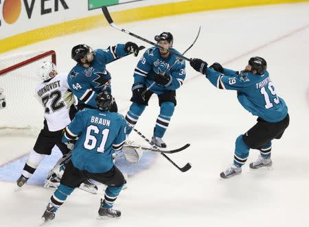 Jun 12, 2016; San Jose, CA, USA; Pittsburgh Penguins right wing Patric Hornqvist (72) watches as San Jose Sharks players Marc-Edouard Vlasic (44) , Logan Couture (39) , Joe Thornton (19) and Justin Braun (61) try to bat the puck out of the air in the third period of game six of the 2016 Stanley Cup Final at SAP Center at San Jose. Mandatory Credit: John Hefti-USA TODAY Sports / Reuters Picture Supplied by Action Images (TAGS: Sport Ice Hockey NHL) *** Local Caption *** 2016-06-13T040918Z_1005237883_NOCID_RTRMADP_3_NHL-STANLEY-CUP-FINAL-PITTSBURGH-PENGUINS-AT-SAN-JOSE-SHARKS.JPG