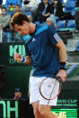 Britain's Andy Murray celebrates after winning a point during a Davis Cup World Group quarterfinal match against Italy's Andreas Seppi in Naples, Italy, Friday, April 4, 2014. (AP Photo/Salvatore Laporta)