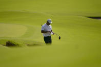 Tiger Woods plays the second hole during a practice round for the PGA Championship golf tournament, Wednesday, May 18, 2022, in Tulsa, Okla. (AP Photo/Matt York)