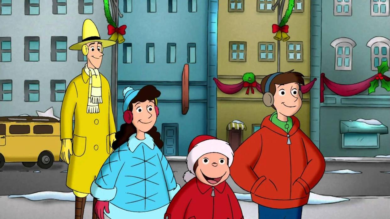 curious george and his friends look at the christmas decorations in a scene from curious george a very monkey christmas, a good housekeeping pick for best christmas movies for kids