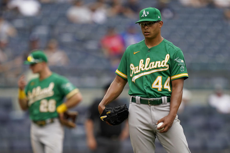 Oakland Athletics' Jesus Luzardo reacts after giving up a go-ahead solo home run to New York Yankees' Gio Urshela in the eighth inning of a baseball game, Saturday, June 19, 2021, in New York. (AP Photo/John Minchillo)