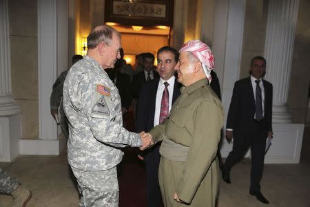Iraqi Kurdish regional President Masoud Barzani (R) meets with Chairman of the Joint Chiefs, U.S. Army General Martin Dempsey in Arbil, north of Baghdad, November 15, 2014. REUTERS/Azad Lashkari
