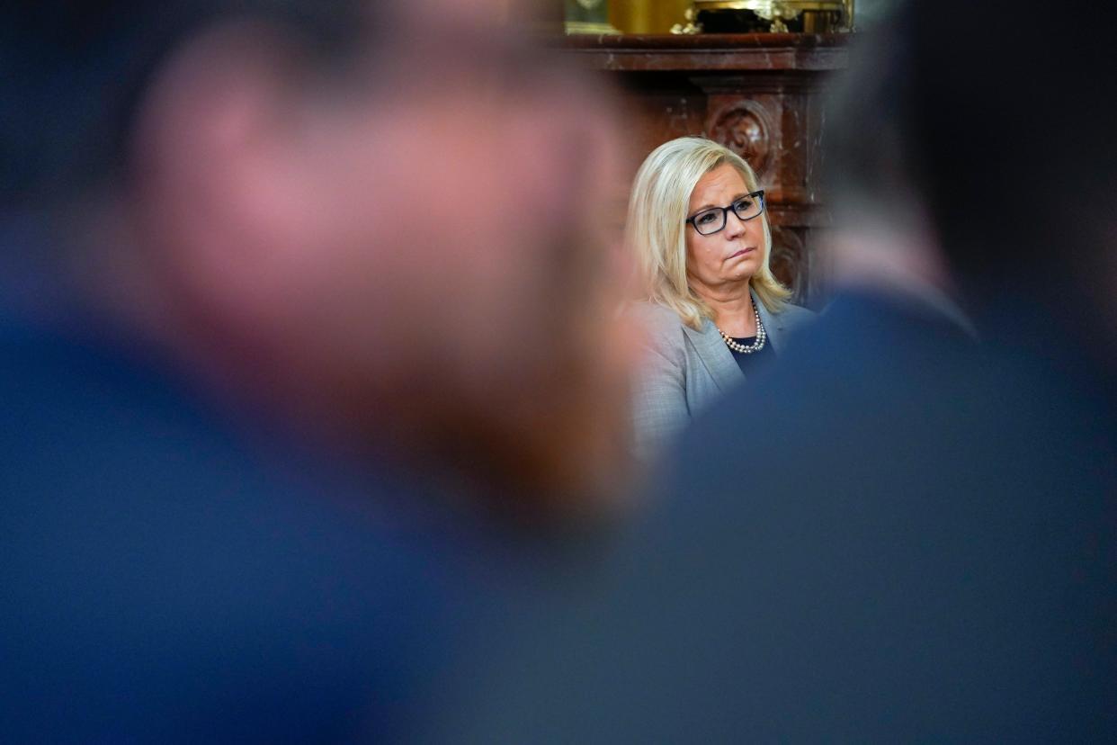 Sen. Liz Cheney, R-Wyo., listens as President Joe Biden speaks during a ceremony to award the nation's highest civilian honor, the Presidential Medal of Freedom, in the East Room of the White House in Washington, Thursday, July 7, 2022. (AP Photo/Susan Walsh) ORG XMIT: DCSW421