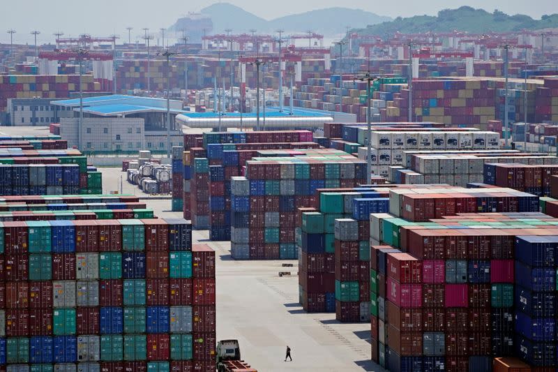 Containers are seen at the Yangshan Deep Water Port in Shanghai