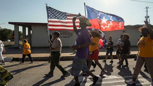 PHOTO: Members of Reedy Chapel African Methodist Episcopal Church march to celebrate Juneteenth on June 19, 2021 in Galveston, Texas. (Go Nakamura/Getty Images, FILE)