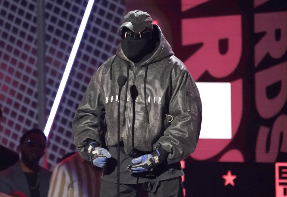 Kanye West, also known as Ye, presents the lifetime achievement award at the BET Awards on Sunday, June 26, 2022, at the Microsoft Theater in Los Angeles. (AP Photo/Chris Pizzello)