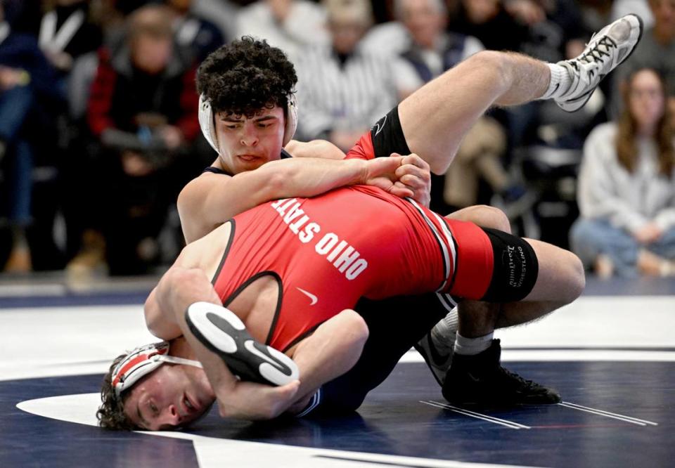 Penn State’s Beau Bartlett controls Ohio State’s Jesse Mendez in overtime of the 141 lb bout during the match on Friday, Feb. 2, 2024 in Rec Hall.