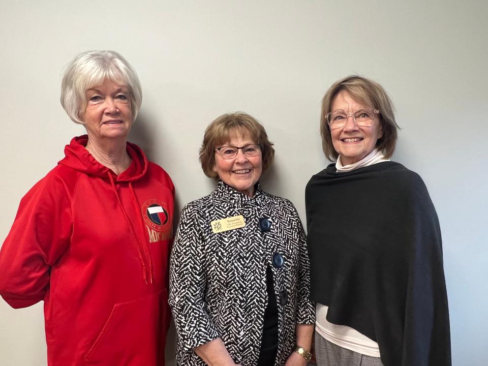 Rhonda Gage, left, president of the General Federation of Women's Club of Lenawee County, stands alongside Roxanne Meeks, center, executive director of the Care Pregnancy Center of Lenawee, and Nancy Anderson, president of the Addison Woman's Club, during the annual meeting of GFWC Lenawee in April at CPC of Lenawee in Adrian.