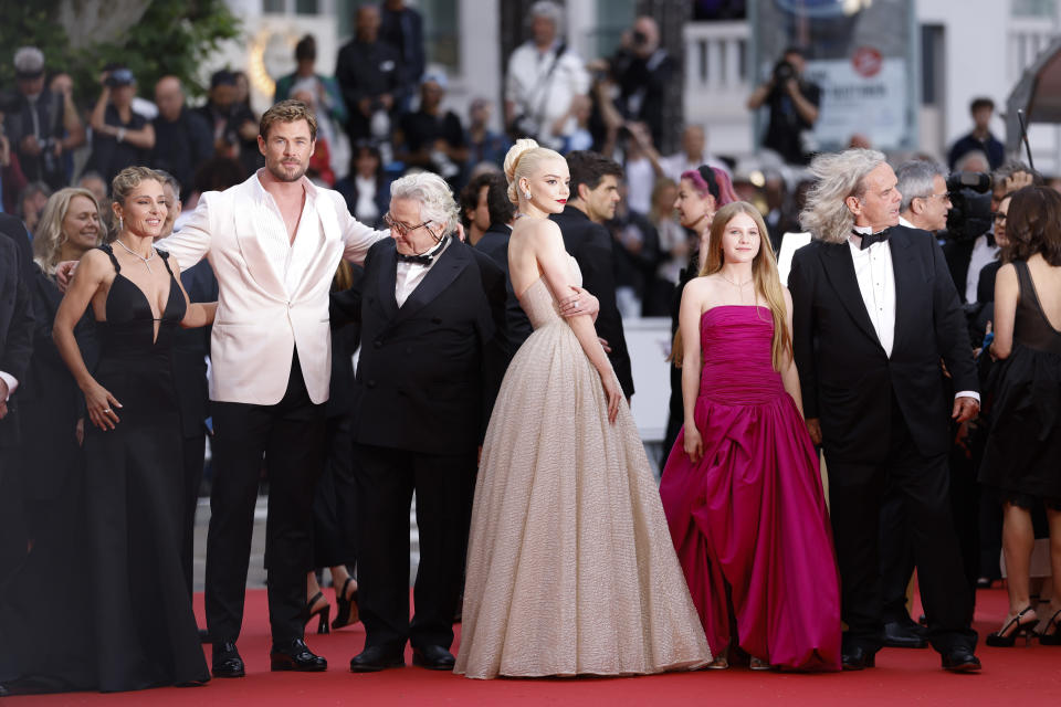 Elsa Pataky, from left, Chris Hemsworth, director George Miller, Anya Taylor-Joy, Alyla Browne, and producer Doug Mitchell pose for photographers upon arrival at the premiere of the film 'Furiosa: A Mad Max Saga' at the 77th international film festival, Cannes, southern France, Wednesday, May 15, 2024. (Photo by Vianney Le Caer/Invision/AP)