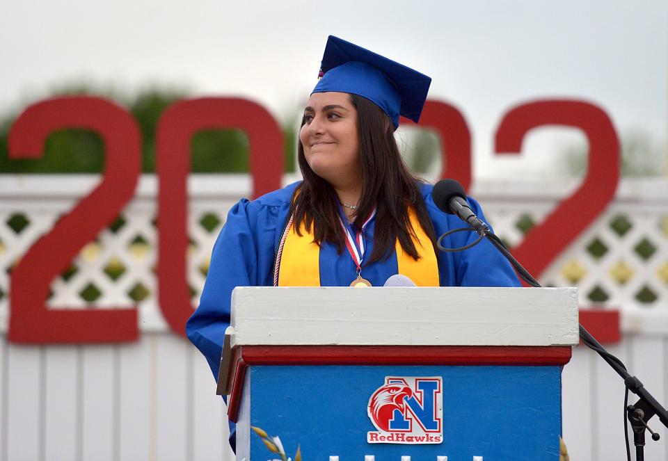 Natick High School graduate Orianna Cappella  speaks at graduation ceremonies at Memorial Field, June 3, 2022.