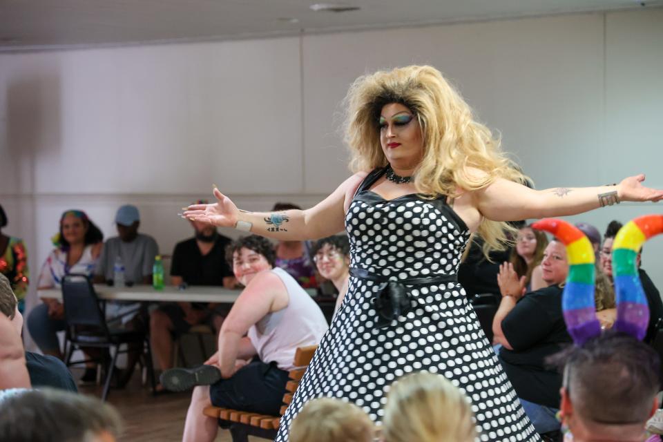 A drag queen performs at the Pride festival in Pulaski, Tenn. LGBTQ Pride events, which have long been mainstay celebrations in big cities, are becoming more common in rural and small-town America.