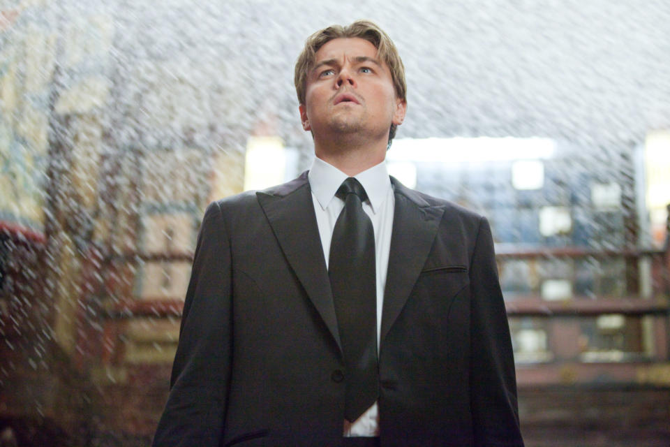 Leonardo DiCaprio in a suit looking up