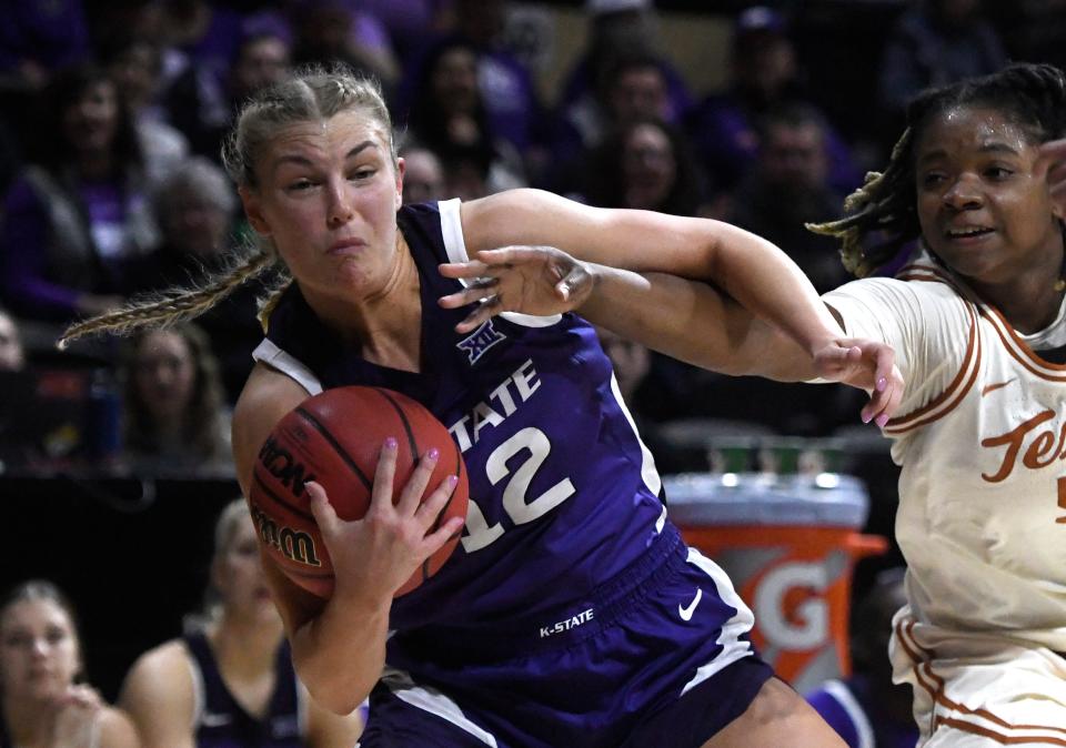 Kansas State guard Gabby Gregory (12) grabs a rebound against Texas during the  2023 Big 12 Tournament at Municipal Auditorium in Kansas City, Mo.