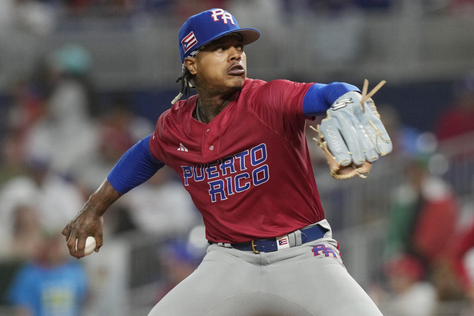 Puerto Rico starting pitcher Marcus Stroman aims a pitch during the first inning of a World Baseball Classic game against Mexico, Friday, March 17, 2023, in Miami. (AP Photo/Marta Lavandier)