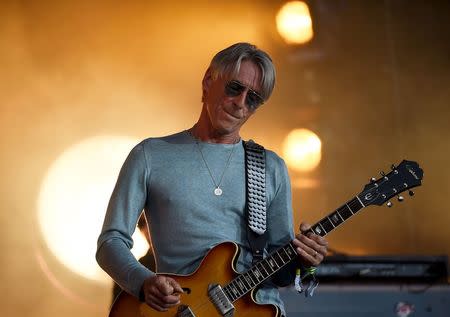 Paul Weller performs on the Pyramid stage at Worthy Farm in Somerset during the Glastonbury Festival in Britain, June 28, 2015. REUTERS/Dylan Martinez