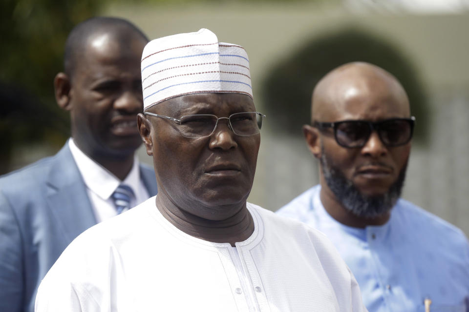 Nigerian presidential candidate, Atiku Abubakar, of the People's Democratic Party, arrives to speak with journalists after the presidential election was delayed by the Independent National Electoral Commission, at his residence in Yola, Nigeria, Saturday, Feb. 16, 2019. A civic group monitoring Nigeria's now-delayed election says the last-minute decision to postpone the vote a week until Feb. 23 "has created needless tension and confusion in the country." (AP Photo/Sunday Alamba)