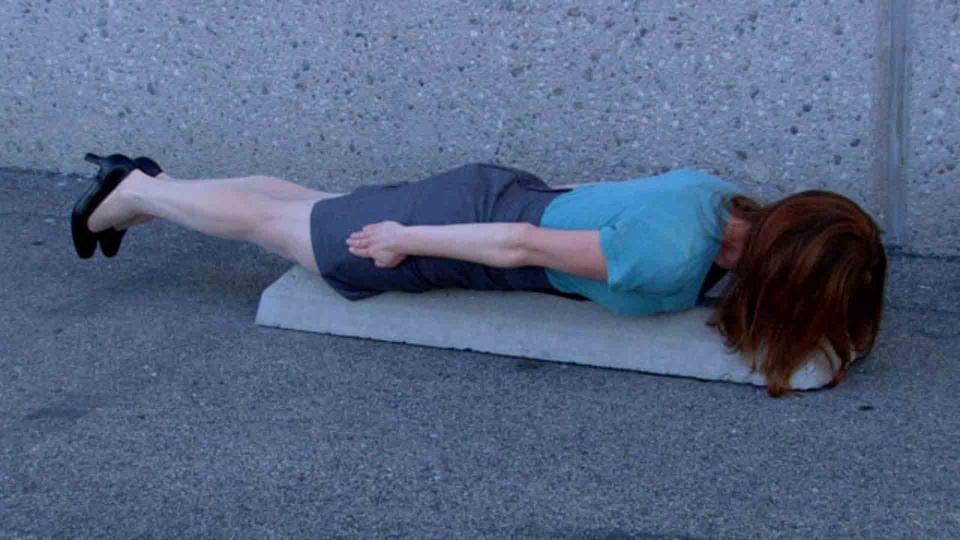 Closeup of a woman planking