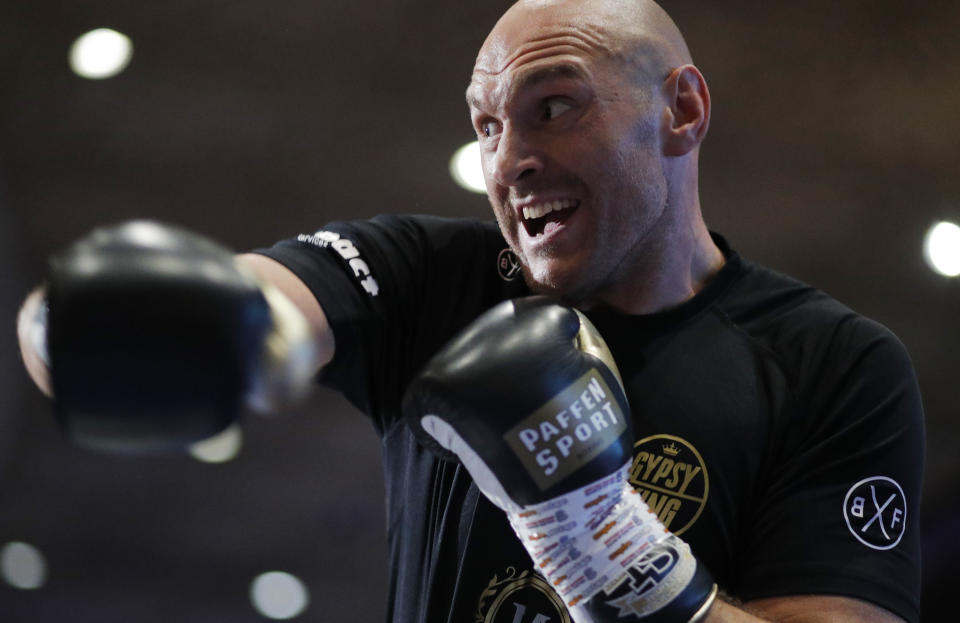 Tyson Fury, of England, works out for fans and the media Tuesday, June 11, 2019, in Las Vegas. Fury is scheduled to fight Tom Schwarz, of Germany, in a heavyweight bout Saturday in Las Vegas. (AP Photo/John Locher)