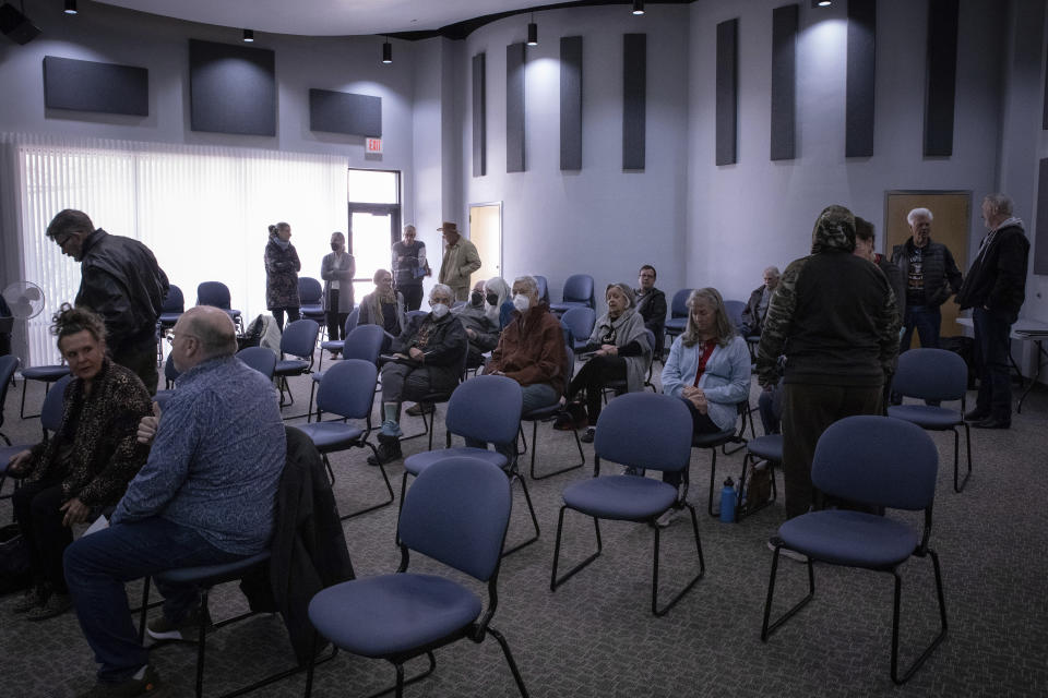 Members of the public attend Cochise County Board of Supervisors meeting to provide feedback on the proposed transfer of election functions and duties to the county recorder, Tuesday, Feb. 14, 2023, in Bisbee, Ariz. (AP Photo/Alberto Mariani)