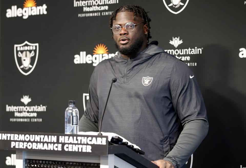 Las Vegas Raiders offensive tackle Alex Leatherwood (70) talks with reporters during NFL football training camp Saturday, July 30, 2022, in Henderson, Nev. (AP Photo/Steve Marcus)