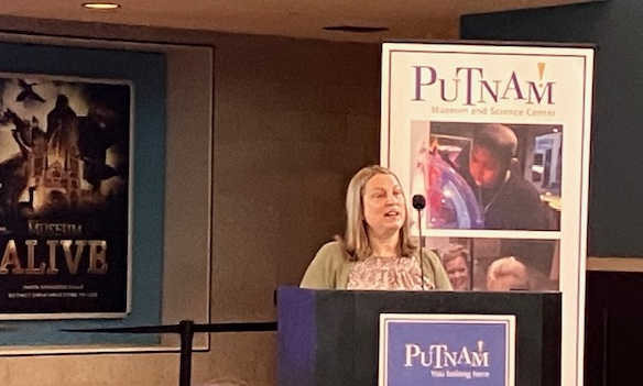 Shaya Smith, 4th-grade teacher at Rock Island Center for Math and Science, speaks at the Putnam Power Breakfast, “A Morning of Giving,” on Wednesday, May 15, 2024 (photo by Jonathan Turner).