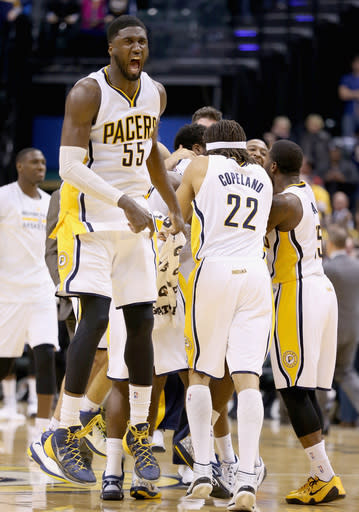 INDIANAPOLIS, IN - NOVEMBER 19: Roy Hibbert #55 of the Indiana Pacers celebrates after the Pacers beat the Charlotte Hornets on a last second basket at Bankers Life Fieldhouse on November 19, 2014 in Indianapolis, Indiana.The Pacers won 88-86. (Photo by Andy Lyons/Getty Images)