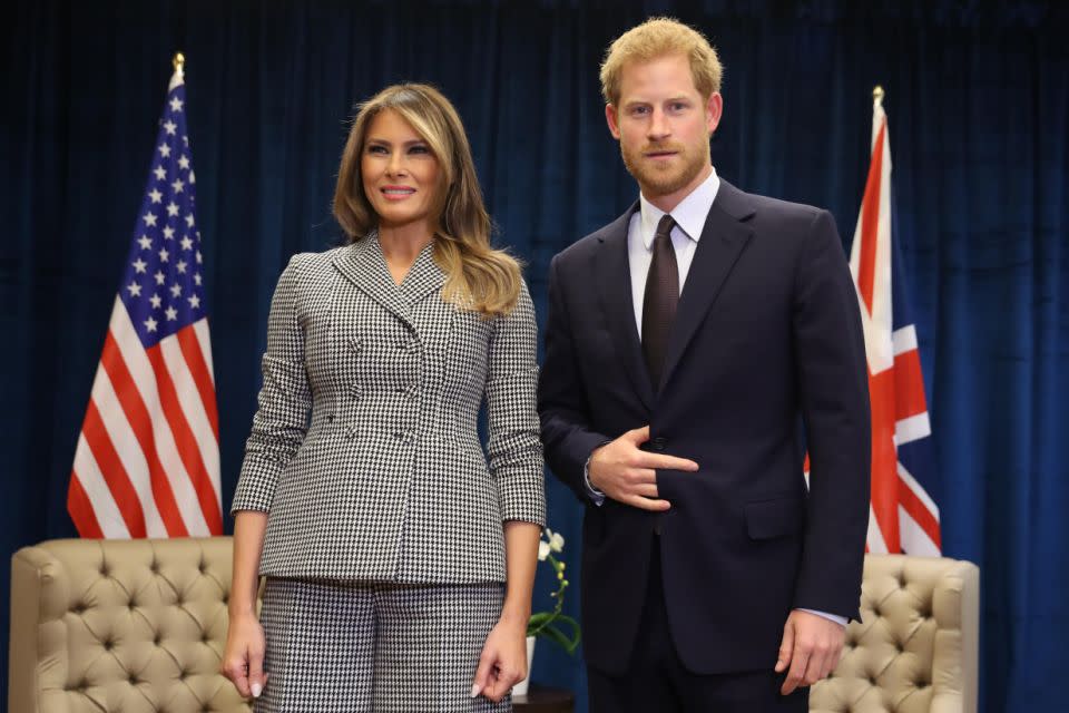 What is Prince Harry doing with his hand while meeting Melania Trump? Photo: Getty