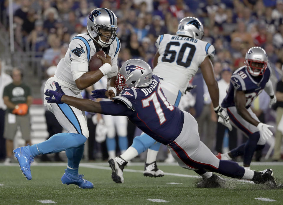 New England Patriots defensive tackle Adam Butler (70) sacks Carolina Panthers quarterback Cam Newton (1) in the first half of an NFL preseason football game, Thursday, Aug. 22, 2019, in Foxborough, Mass. (AP Photo/Elise Amendola)