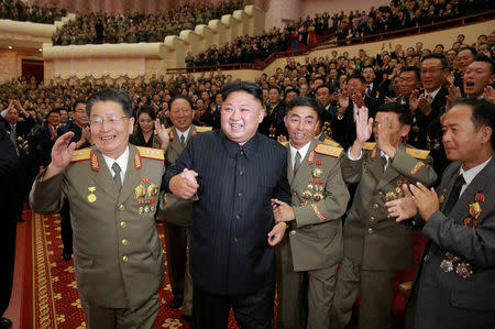 North Korean leader Kim Jong Un reacts during a celebration for nuclear scientists and engineers who contributed to a hydrogen bomb test, September 2017. KCNA via REUTERS