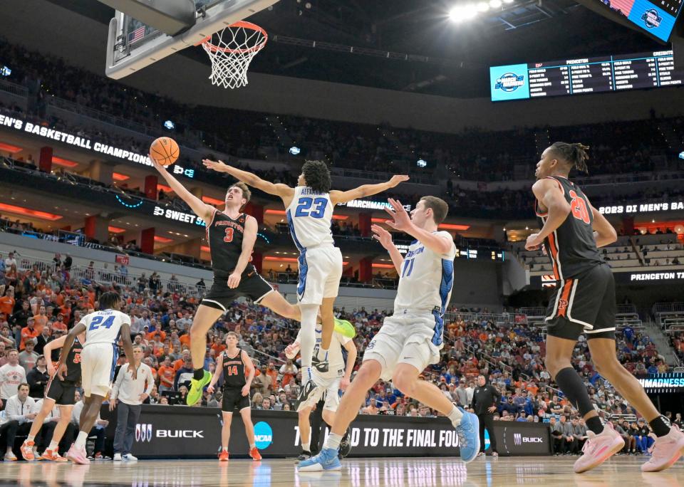 Mar 24, 2023; Louisville, KY, USA; Princeton Tigers guard Ryan Langborg (3) shoots against Creighton Bluejays guard Trey Alexander (23) during the second half of the NCAA tournament round of sixteen at KFC YUM! Center. Mandatory Credit: Jamie Rhodes-USA TODAY Sports