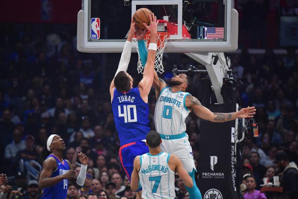 Los Angeles Clippers center Ivica Zubac (40) moves to the basket against Charlotte Hornets forward Miles Bridges (0) during the first half at Crypto.com Arena.