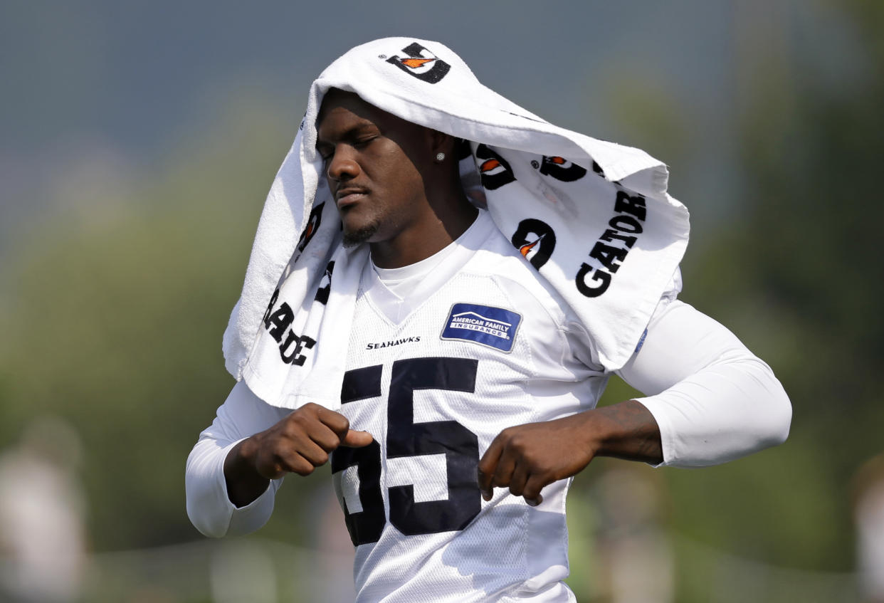 Seattle Seahawks’ Frank Clark stretches during training camp last year;<br>Clark revealed on Sunday that he lost four family members in a fire. (AP)