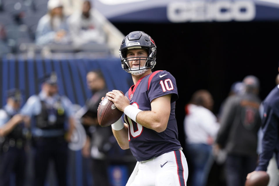 Houston Texans quarterback Davis Mills warms up before an NFL football game against the Chicago Bears Sunday, Sept. 25, 2022, in Chicago. (AP Photo/Charles Rex Arbogast)