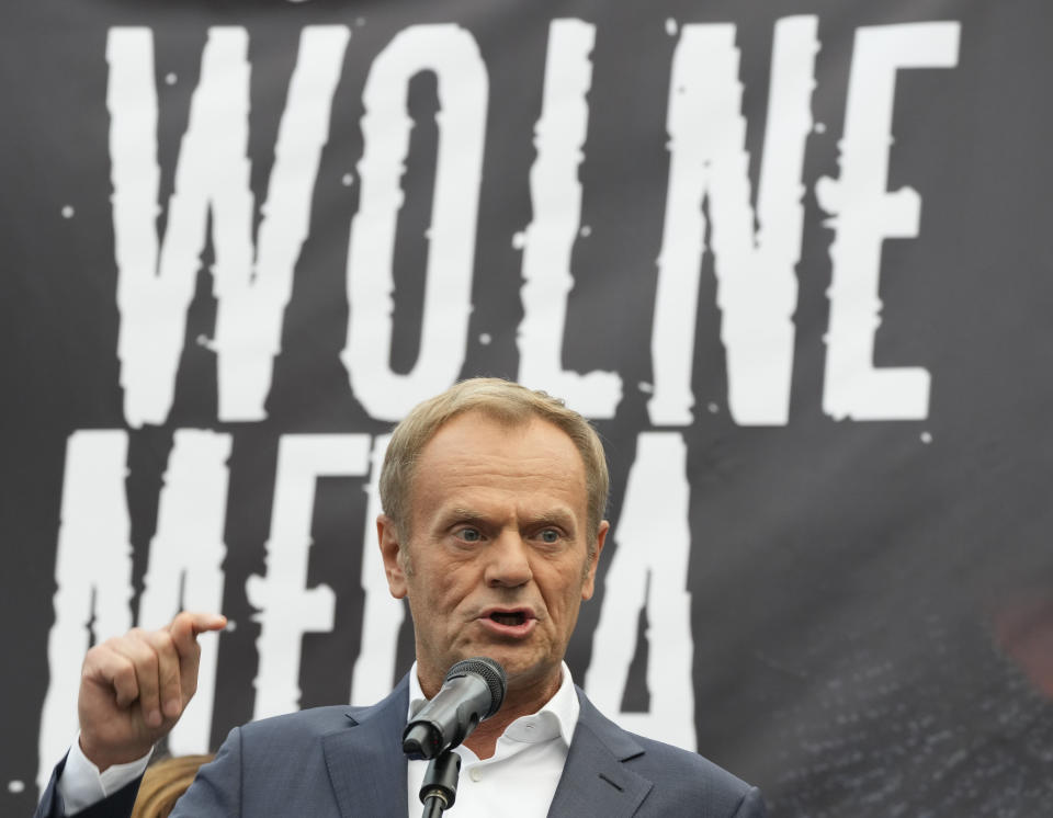 Donald Tusk, the leader of the Polish opposition party Civic Platform, speaks to a crowd of protesters in defense of media freedom in Warsaw, Poland, on Tuesday, Aug. 10, 2021. Poles demonstrated nationwide Tuesday against a bill widely viewed as a effort by the country's nationalist ruling party to silence an independent, U.S.-owned television broadcaster that is critical of the government.(AP Photo/Czarek Sokolowski)